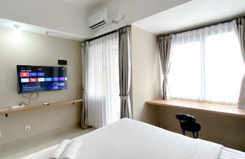 Duren Sawit Apartment | Good Choice and Cozy Studio Gateway Park LRT City Jatibening Apartment By Travelio