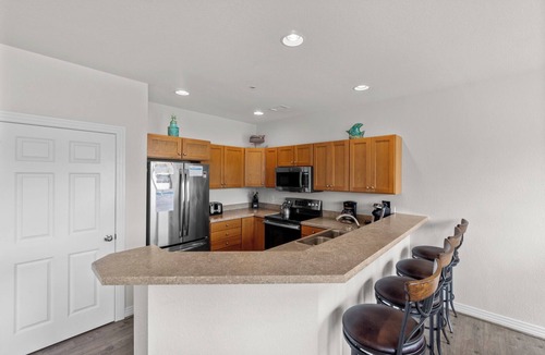 Bermuda Bay Condo | OBX for R&R at Hamilton Cay, Water Park Access, No Check In Day Restrictions
