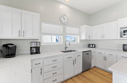 Plantation House | Seven Seas: Book your stay and enjoy the Island's first Splash Pad!
