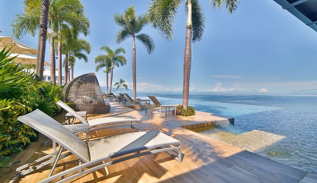 Beachfront Luxury + Direct Beach Access + Rooftop Pools + Views in Puerto Vallarta