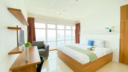 Best Homey and Spacious 3BR at Green Bay Condominium Apartment By Travelio in Jakarta