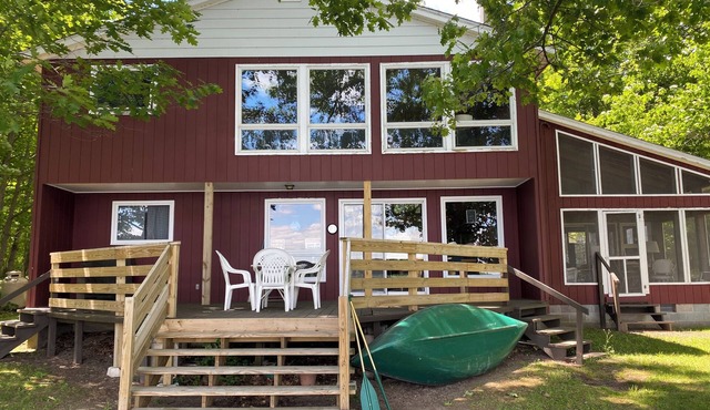 Clean, Rustic 4-bedroom cabin nestled in the woods in Sackets Harbor in Sackets Harbor