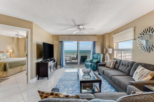 Direct oceanfront corner condo with spacious balcony and heated beachfront pool in Ormond Beach