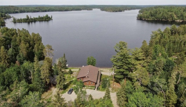 Hill Top Cabin with Stunning Lake View shared Hot tub and Sauna! in Nestor Falls