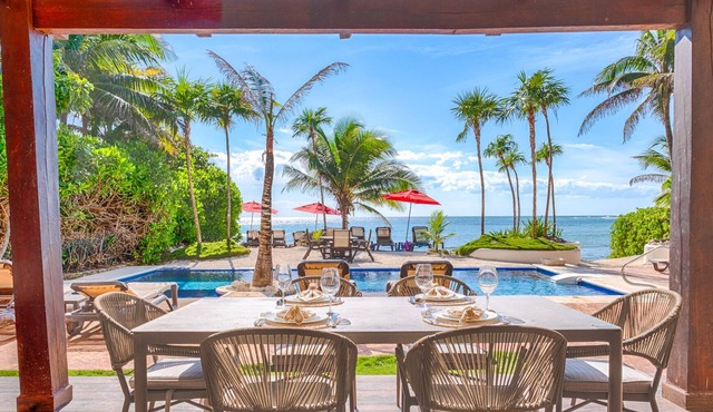 Stylish upscale condo on the beach, AC, swimming pool, beachfront! in AKUMAL