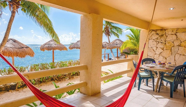 Tropical beachfront condo! AC, swimming pool! in Akumal