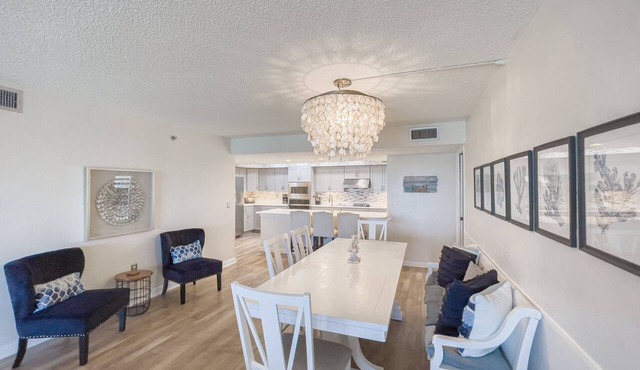 Updated direct oceanfront corner condo with private balcony, heated pool and garage in Ormond Beach