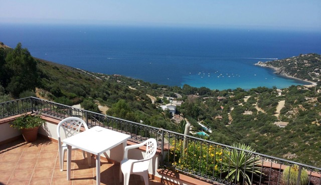 Villa Nettuno with a breathtaking view of the bay of Torre delle Stelle in Solanas