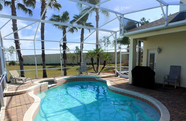 Classically elegant 4/3 Pool Home on the premier golfing community Highlands Reserve in Davenport