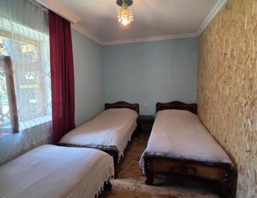 Quadruple Room with Shared Bathroom