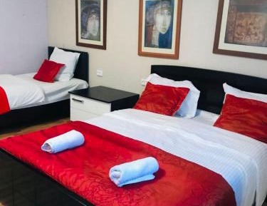 Quadruple Room with Shared Bathroom
