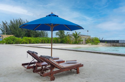 Hulhule Hotel | Hulhule Island Hotel- Private Beach Access & Airport Pick-up and Drop